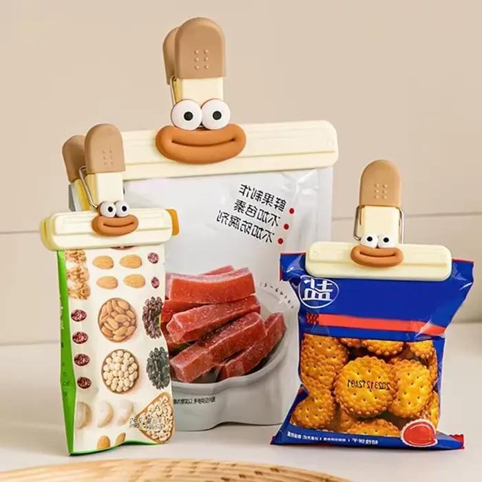 Lot de 2 pinces de scellage créatives en forme de bouche de saucisse pour sacs à nouilles, préservation alimentaire, anti-humidité, sacs de conservation en plastique scellés