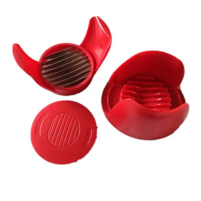 Trancheuse à tomates en plastique rouge