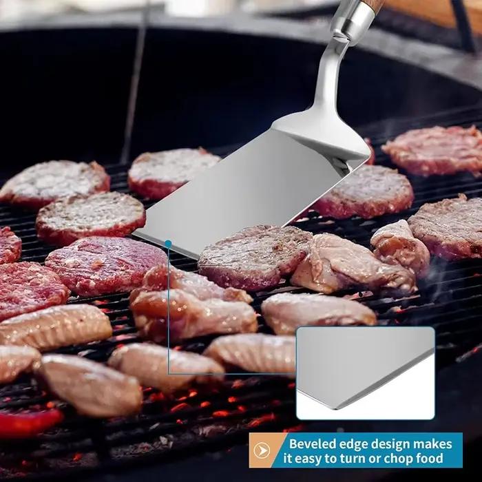 Spatule en acier inoxydable avec manche en bois