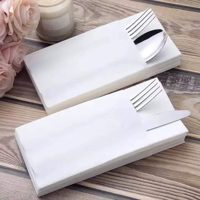25/50/100PCS Serviettes en papier blanches jetables pour couteaux et fourchettes avec pochette intégrée pour couverts