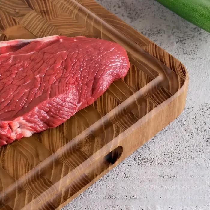 Planche à découper en teck de grain d'extrémité pour la cuisine