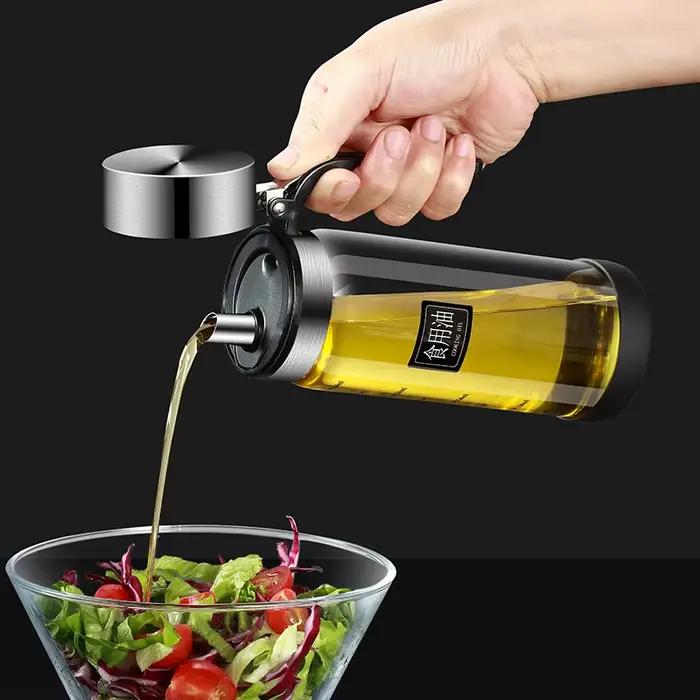 Bouteille d'huile en verre avec couvercle rabattable