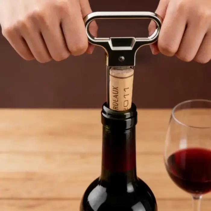 Ouvre-bouteille à pompe manuel