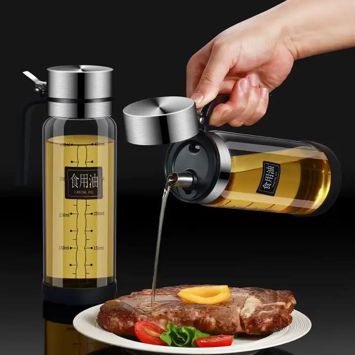Bouteille d'huile en verre avec couvercle rabattable