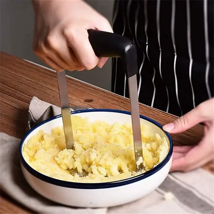 Poussoir de pommes de terre en acier inoxydable