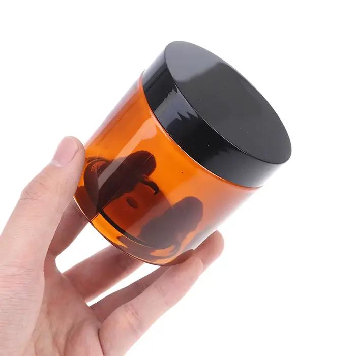 Pot à crème rond ambre doublure intérieure pour zones de salve design moderne pour soins de la peau cosmétiques à offrir pour occasions spéciales
