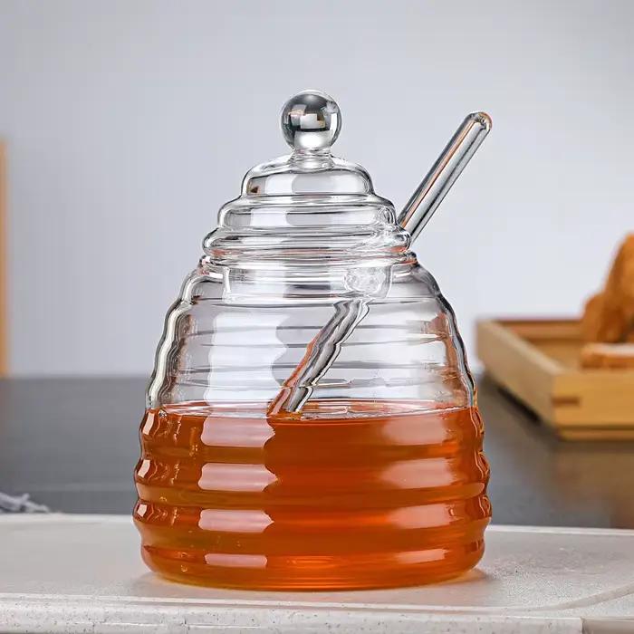 Récipient de stockage de miel précieux en accent d'abeille en verre avec louche et couvercle