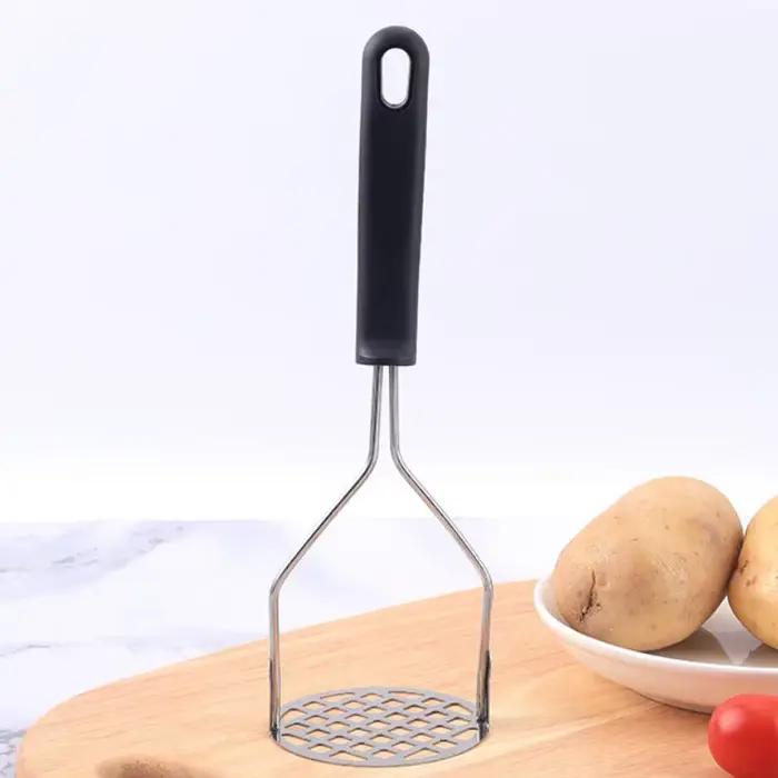 Poussoir de pommes de terre en acier inoxydable