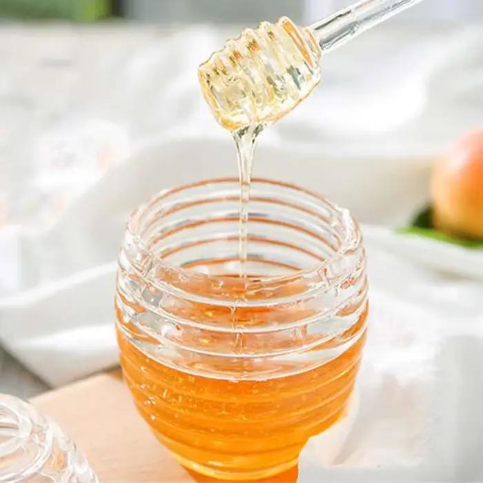 Pot de miel créatif en nid d'abeille avec bâton d'agitation