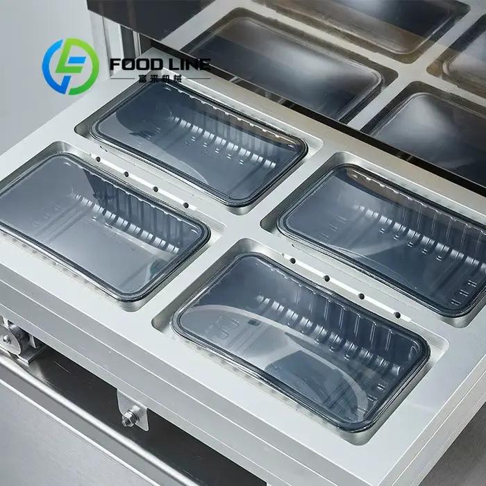 Appareil d'emballage sous atmosphère modifiée pour aliments cuits, bonne performance d'étanchéité, prévient l'oxydation et la dégradation des plats préparés