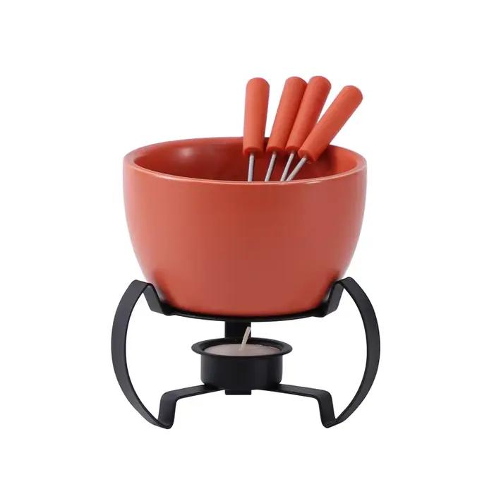 Ensemble de pot à fondue au chocolat avec fourchettes
