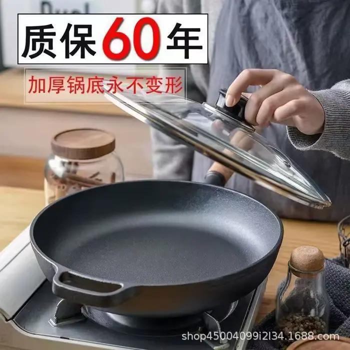 Poêle à fond plat en fonte