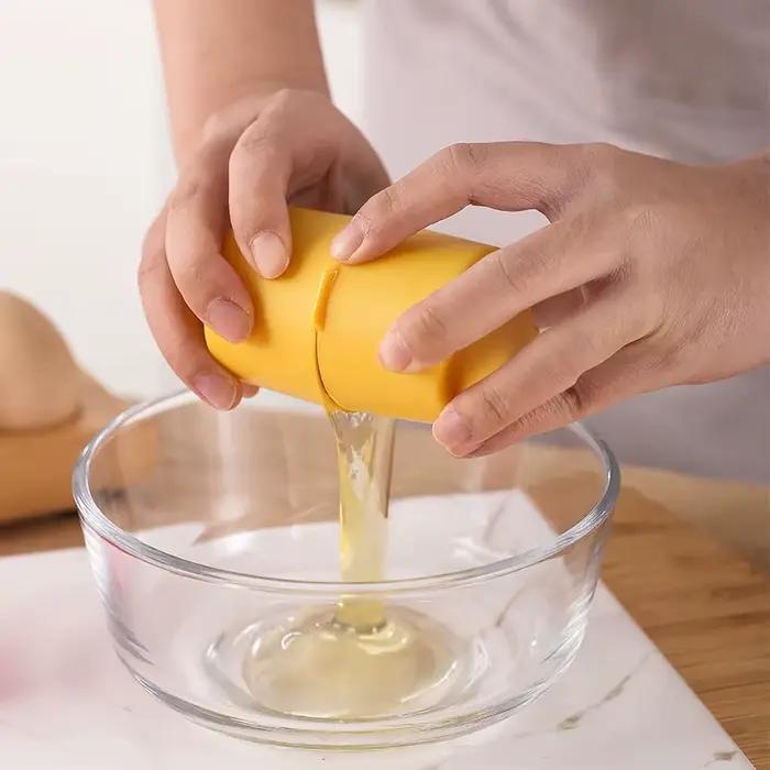 Outil multifonctionnel pour casser, séparer et mélanger les œufs en plastique noir pour une cuisine pratique et respectueuse de l'environnement