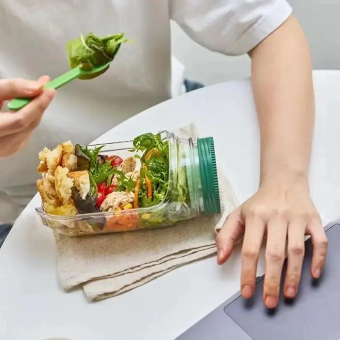 Récipient tout-en-un de dosette de salade portable en plastique ovale orange pour emporter des salades fraîches et équilibrées à tout moment
