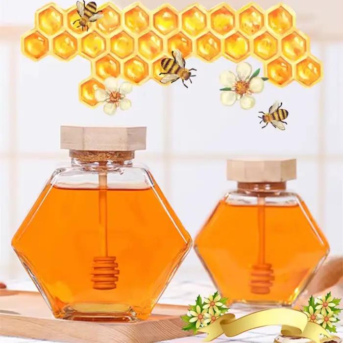 Bouteille de miel en verre hexagonale avec pot en bois