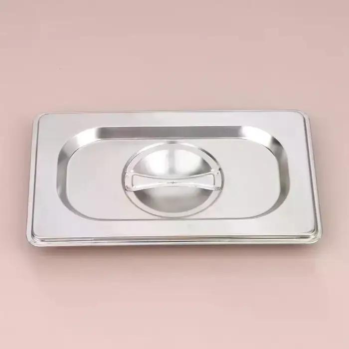 Couvercles à encoches en acier inoxydable avec poignée et verrouillage pour bacs alimentaires 1/9