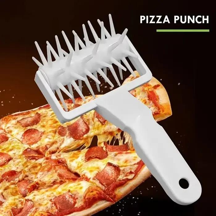 Coupe-pizza et rouleau clouté