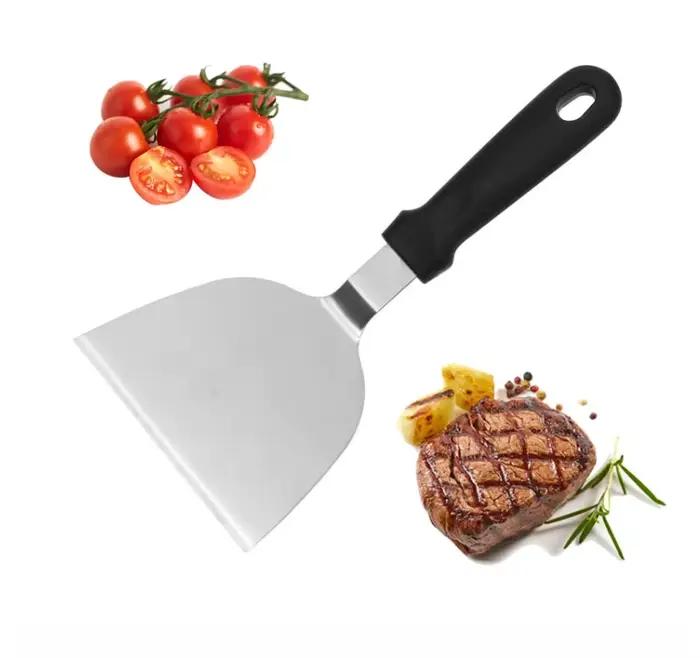 Spatule de plaque chauffante en métal en acier inoxydable