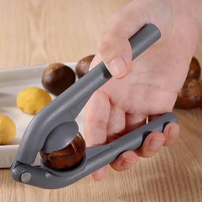 Outil de coupe de châtaignes multifonctionnel pour soirées en famille et occasions spéciales en plastique rouge ergonomique et robuste