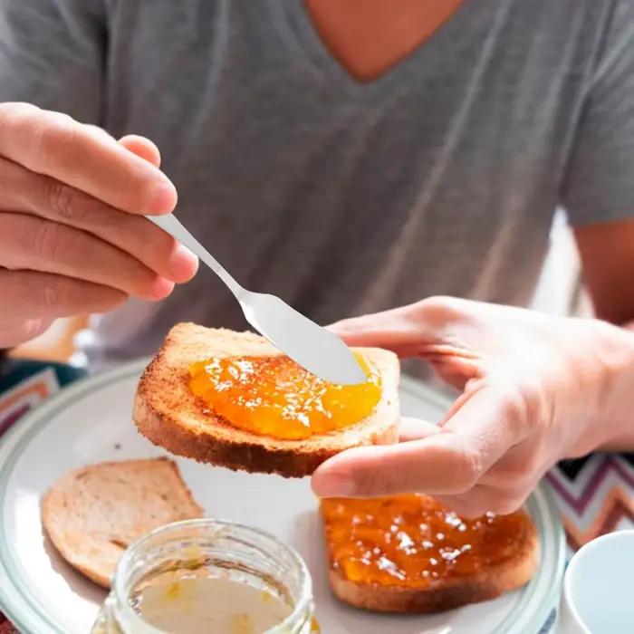 Couteau à beurre en acier inoxydable multifonctionnel pour fromage confiture et pain variété de couleurs pour cuisine moderne occasions spéciales