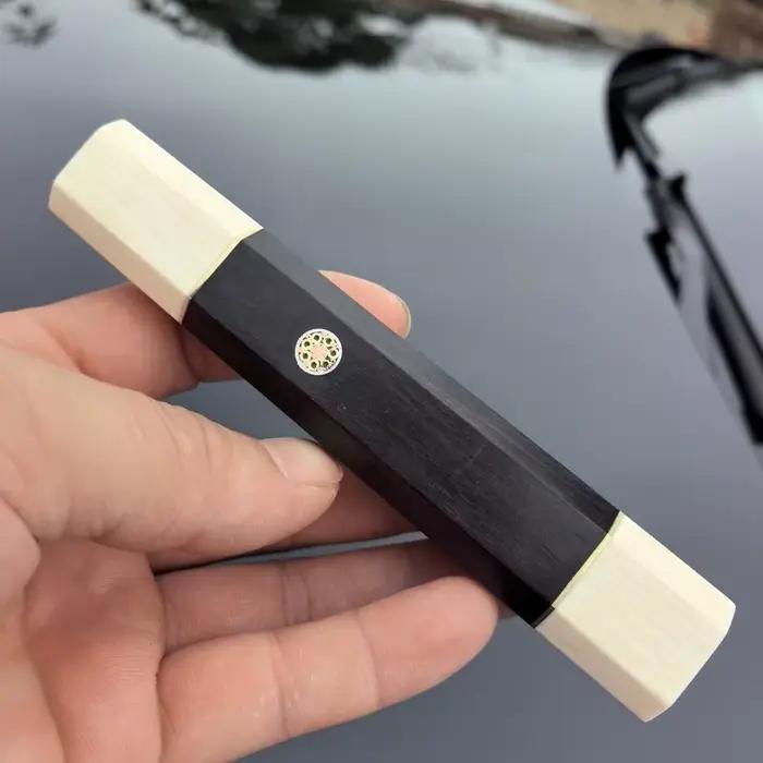 Couteau octogonal japonais en bois noir