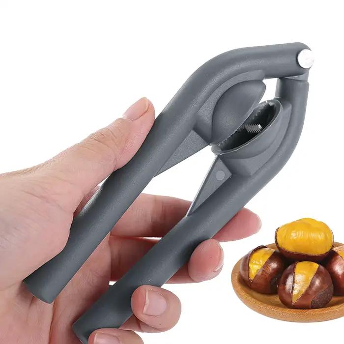 Outil de coupe de châtaignes multifonctionnel pour soirées en famille et occasions spéciales en plastique rouge ergonomique et robuste