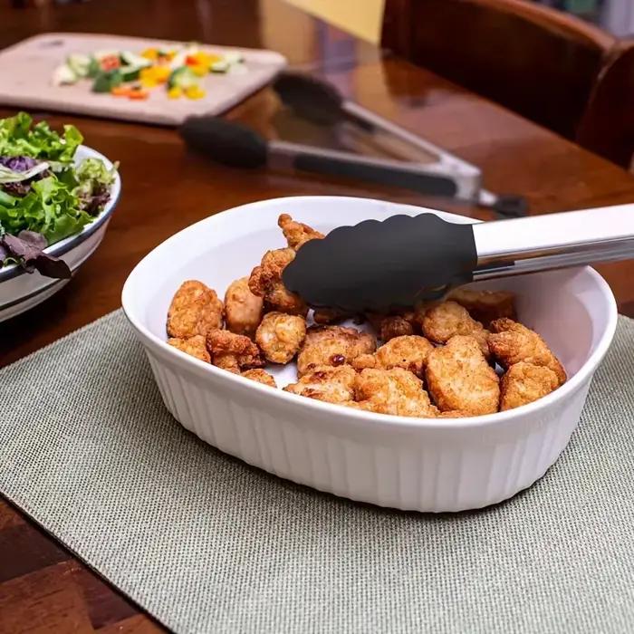 Pinces de cuisine robustes en acier inoxydable avec embouts en silicone, résistantes aux hautes températures, design verrouillable, prise en main sécurisée, disponibles en 3 tailles