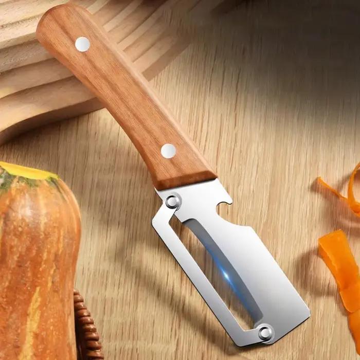 Éplucheur en acier inoxydable avec manche en bois pour éplucher et trancher les fruits et légumes | Fonctionnement