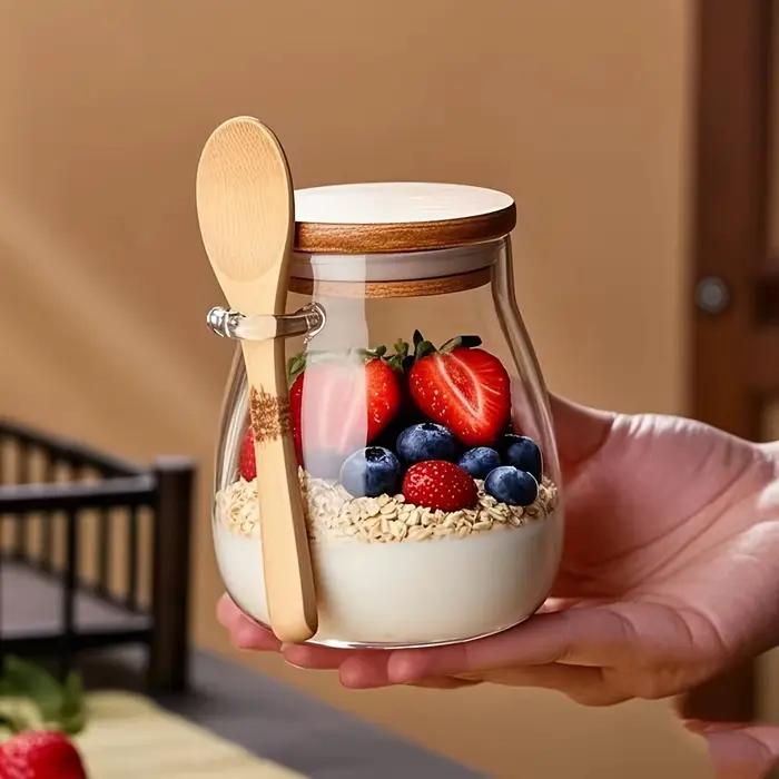 Pot en verre scellé à la mode avec cuillère et couvercle