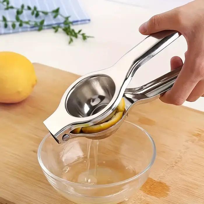 Presse-citron en acier inoxydable
