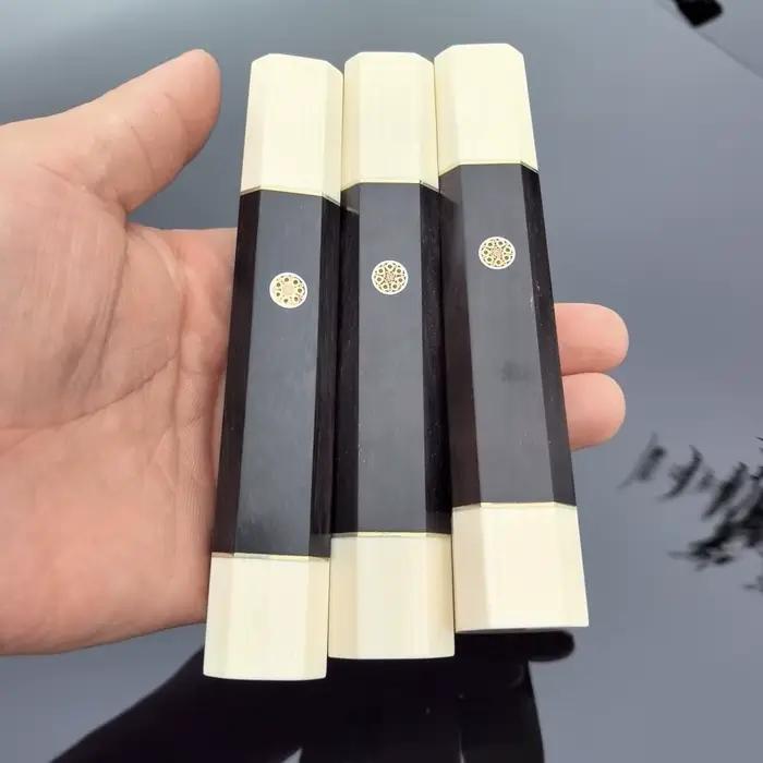 Couteau octogonal japonais en bois noir