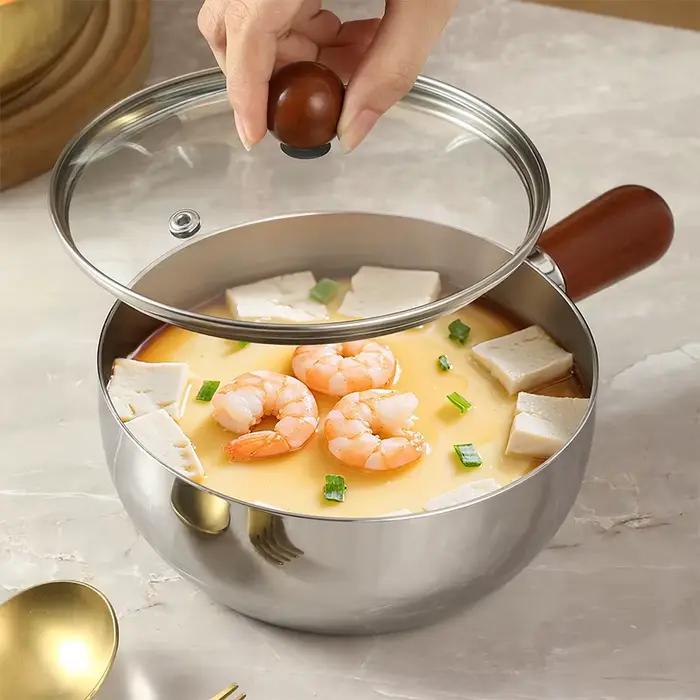 Casserole à lait en acier inoxydable avec poignée en bois pour faire frire des œufs et réchauffer le lait idéale pour les petits-déjeuners et brunchs familiaux