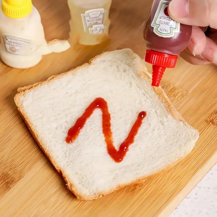 Mini bouteille à presser de 25ml, conteneur d'assaisonnement en plastique portable pour sauce tomate, bureau et voyage, 4 pièces