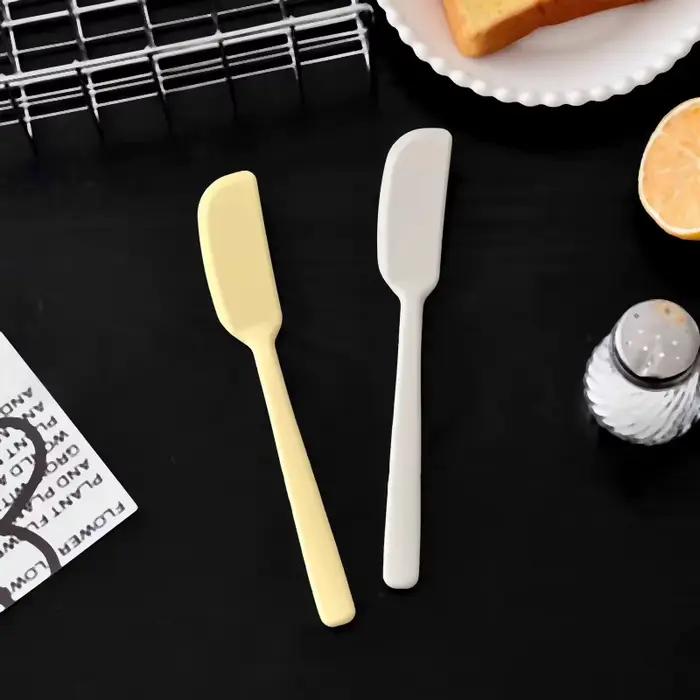 Couteau à beurre coupe-fromage