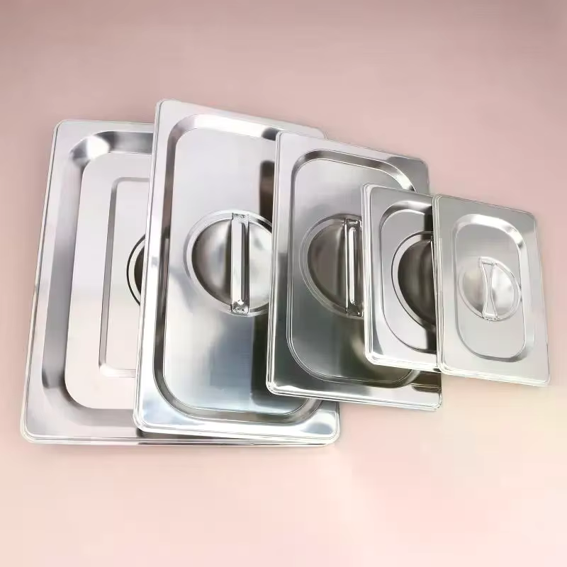 Couvercles à encoches en acier inoxydable avec poignée et verrouillage pour bacs alimentaires 1/9